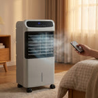 Evaporative air cooler with remote in use — bedroom setting